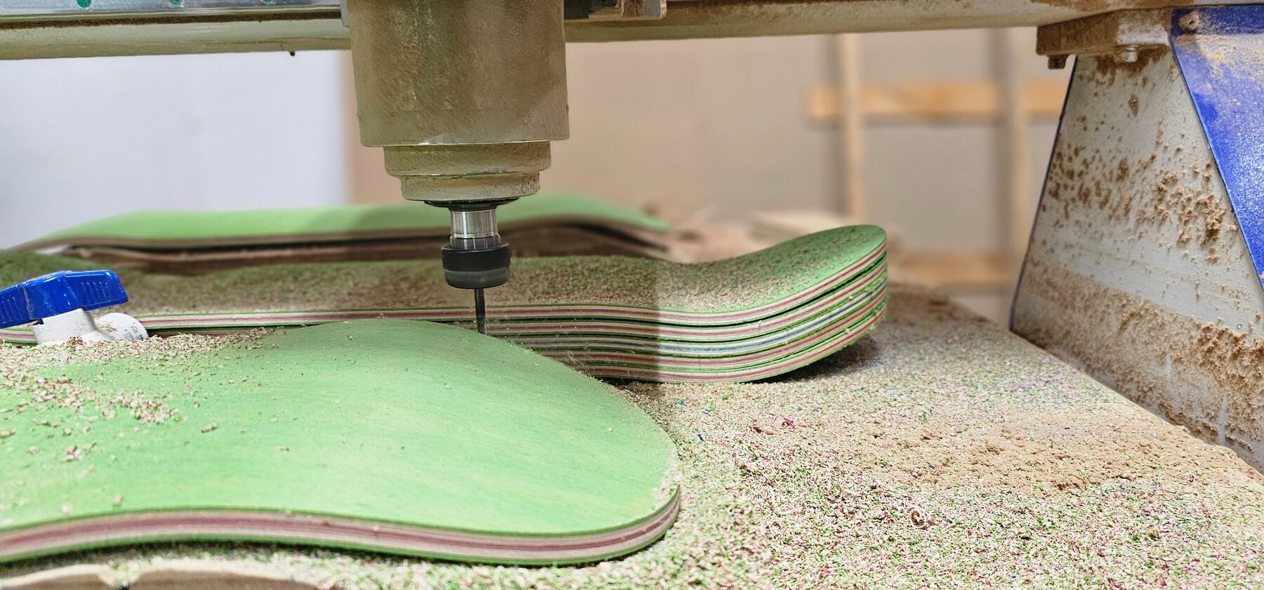 CNC spindle machining a custom skateboard production jig